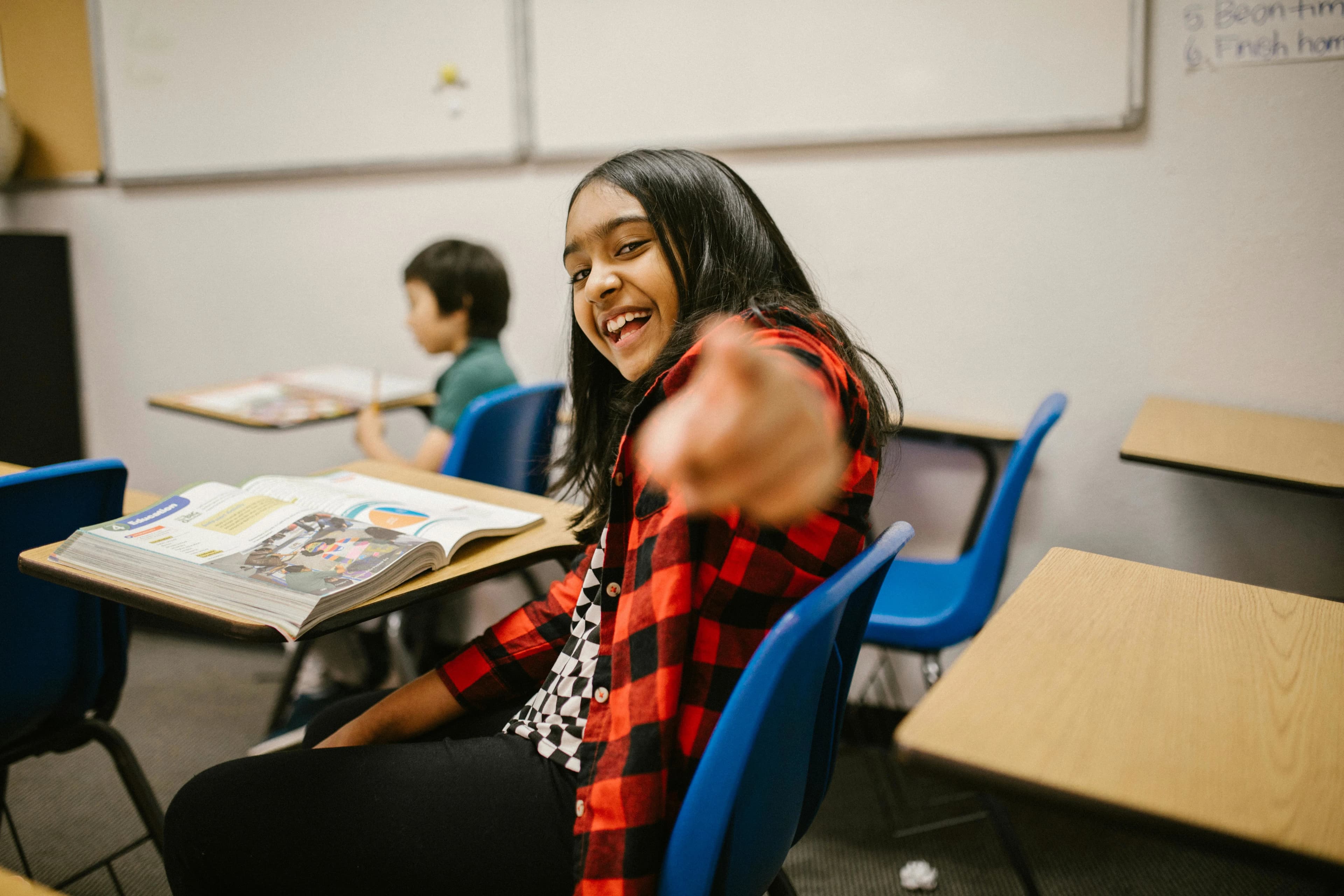Student pointing playfully